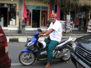 Ketut on his motorbike.